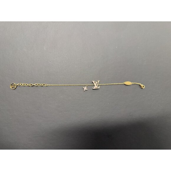 Louis Vuitton Gold-Tone Bracelet With LV Logo & Flower Charm Adjustable Chain In - Picture 8 of 8